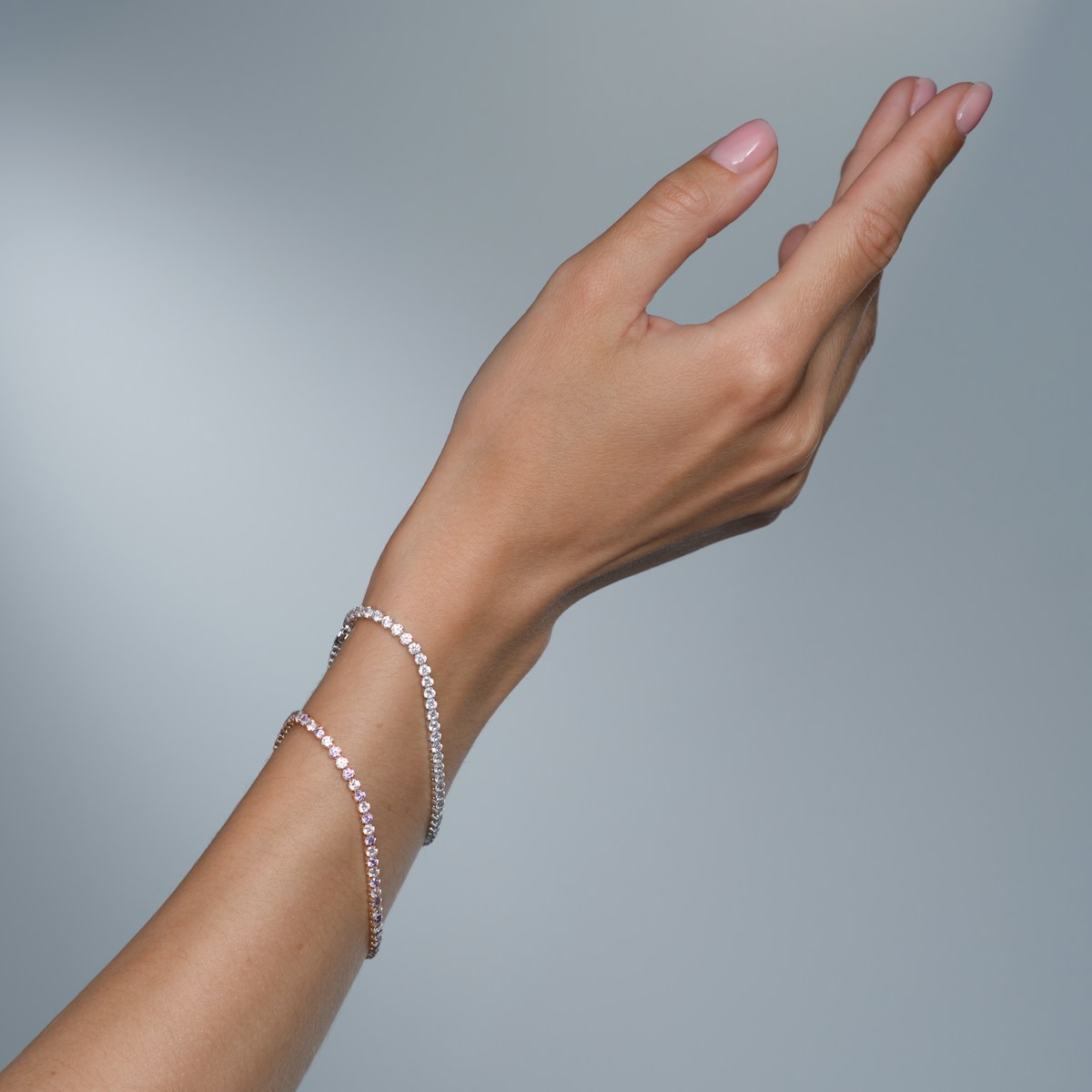 A woman's hand with a bracelet on it